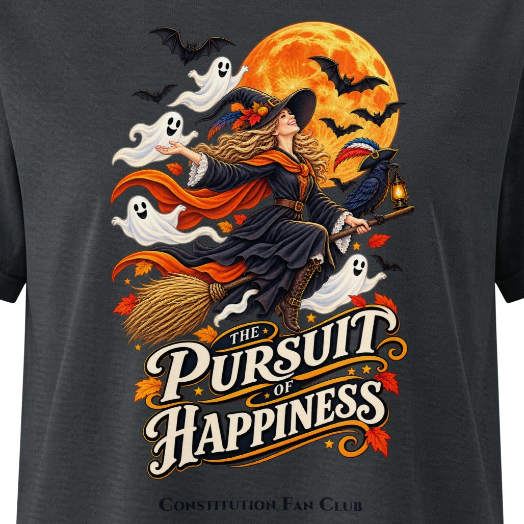 The Pursuit of Happiness women’s Halloween T-shirt with witch riding a broom, ghosts and full moon